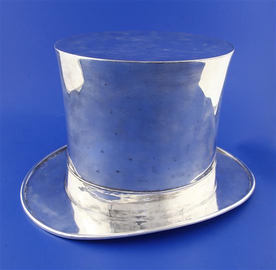 A 20th century Asprey silver plated novelty wine cooler modelled as a top hat, height 7.5in.